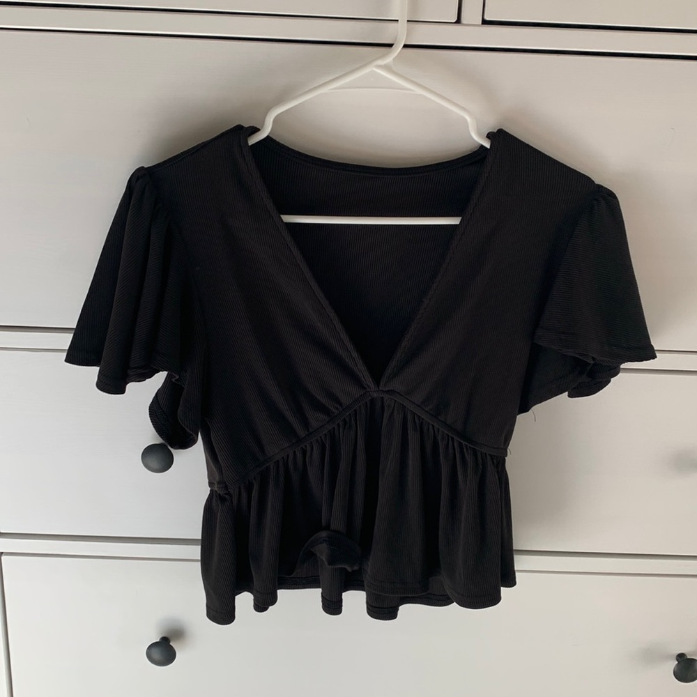 Black plunge neck top